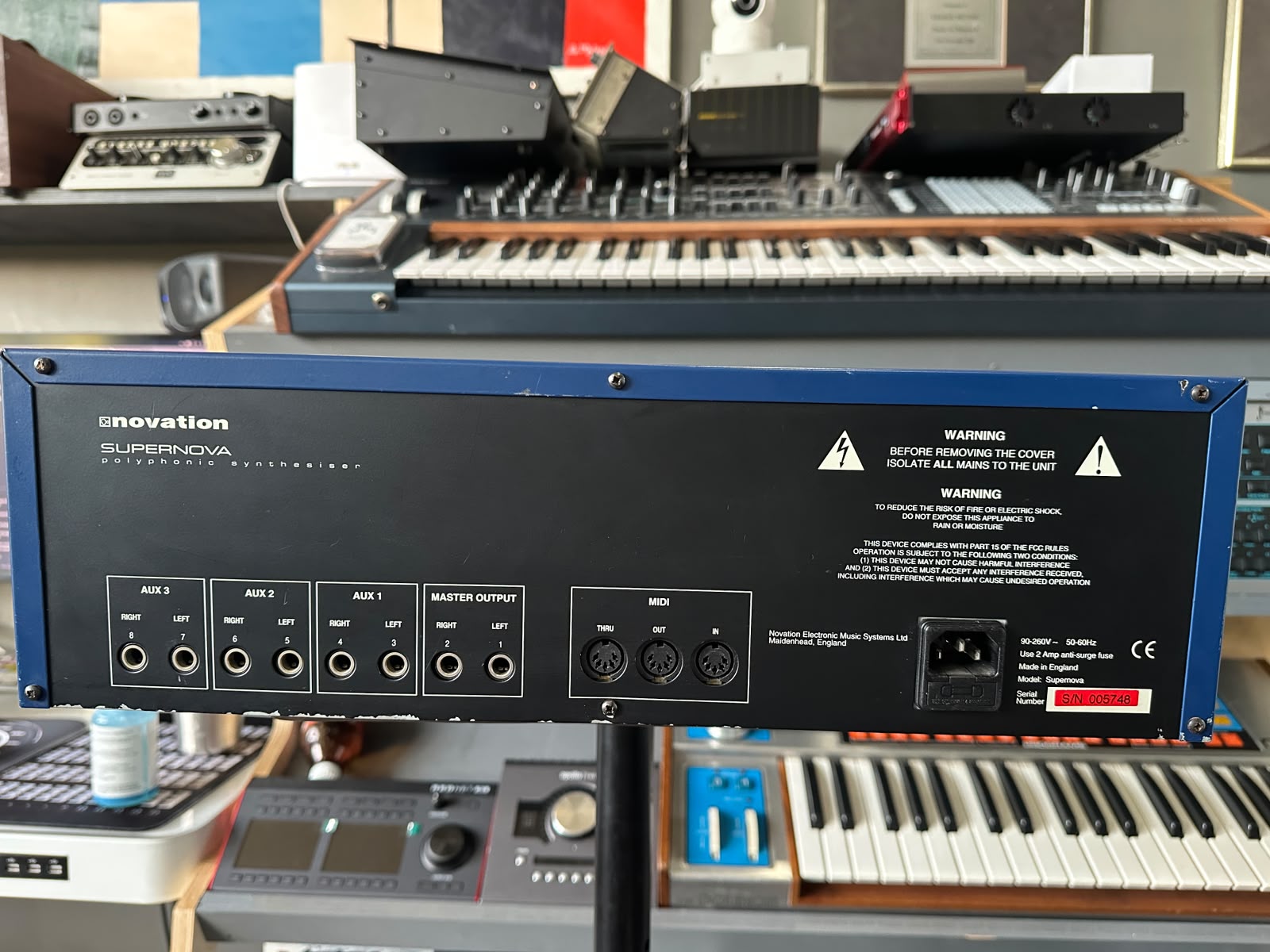 Novation Supernova rear panel with MIDI, aux outs, and serial number