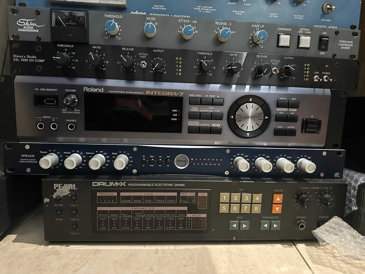 Roland Integra-7 SuperNATURAL sound module, shown mounted in a studio rack alongside other gear