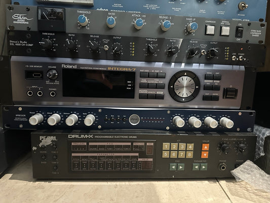Roland Integra-7 SuperNATURAL sound module, shown mounted in a studio rack alongside other gear